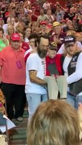 Trump Supporters Carry World War II Veteran to His Seat at Rally