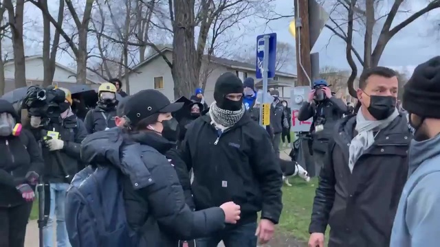 CNN Crew Member Struck in the Head with a Bottle of Water by Protester in Brooklyn Center, Minn.