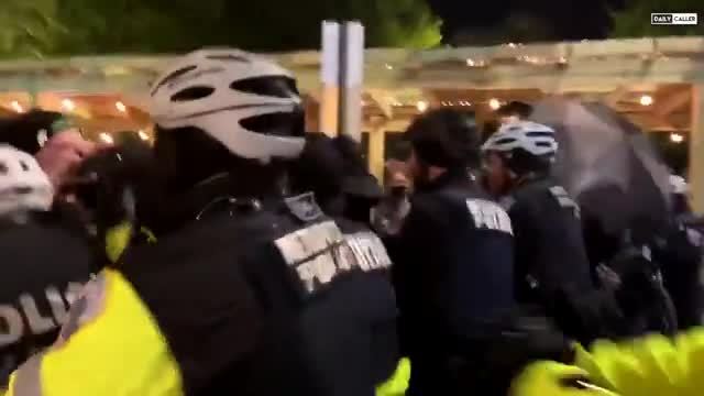 Scuffle Breaks Out Between Protestors and Police
